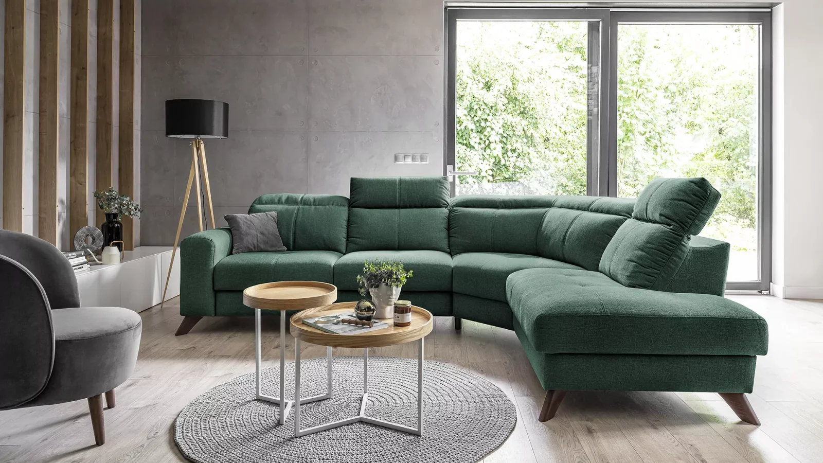 How to style a dark green velvet sofa for a luxurious living room
