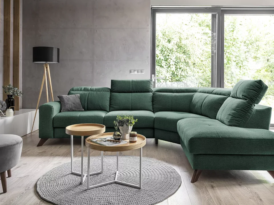 How to style a dark green velvet sofa for a luxurious living room