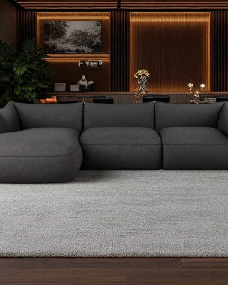 Make a statement with the timeless edge of a black corner sofa
