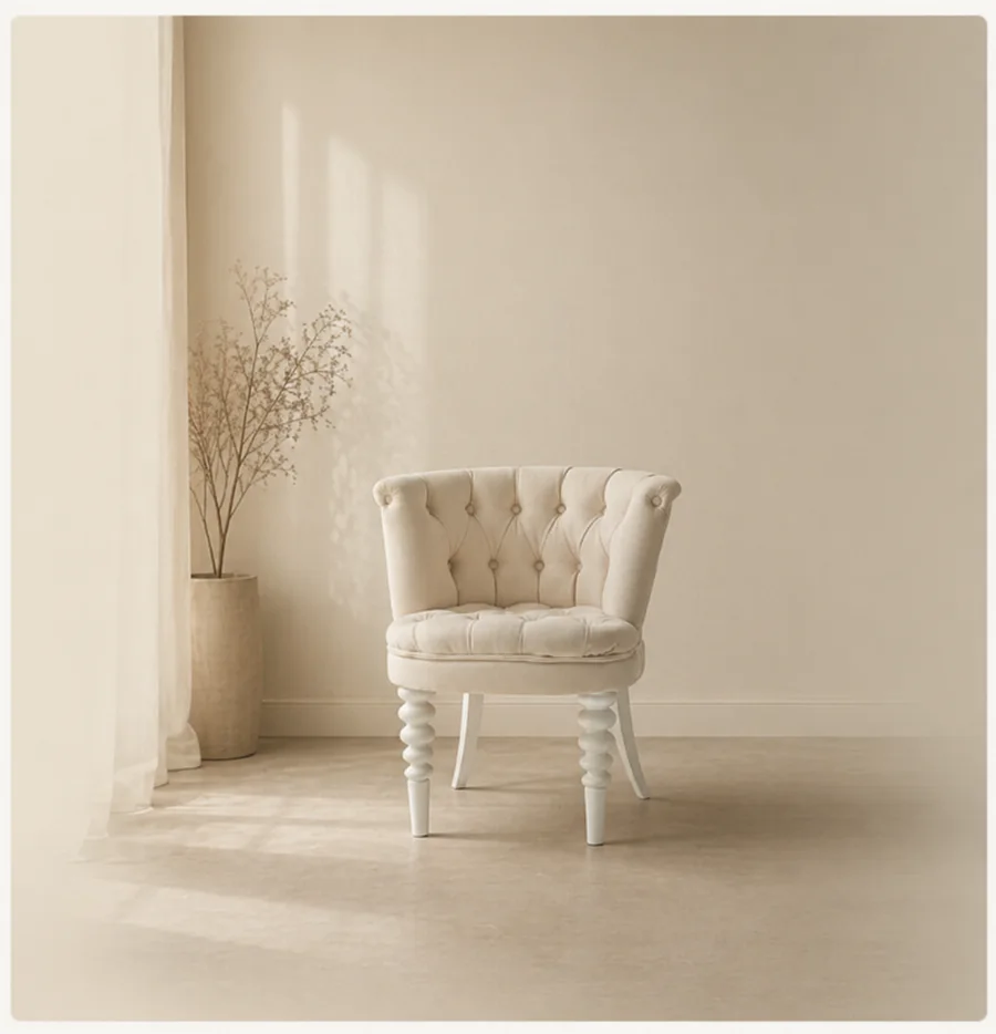 Tufted armchair in a softly lit corner